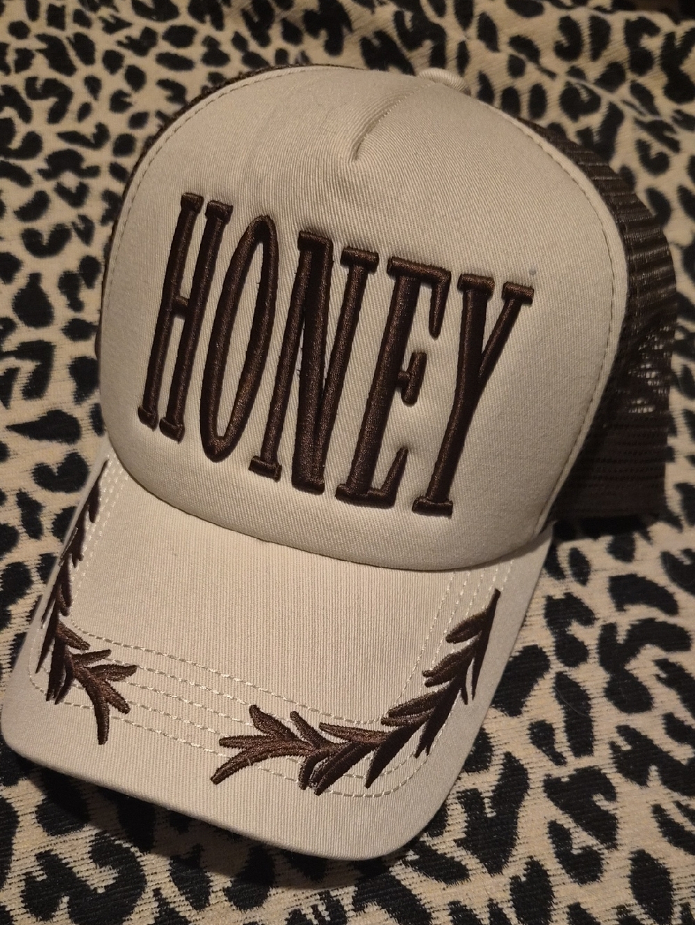 Buckle Cream and Brown "HONEY" Trucker Hat